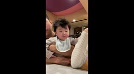 Baby’s cute reaction after trying adult food in Iwata, Japan