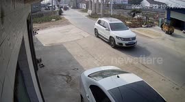 Electric tricycle veers off road and crashes into parked car