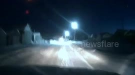 Drunk man on snowmobile nearly rams police car head-on