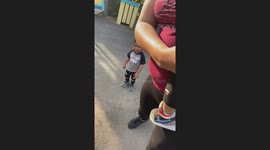 Kids get scared by donkey at zoo in Broussard, Louisiana, USA