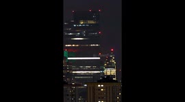 A Moonrise behind 22 Bishopsgate within Central London, United Kingdom