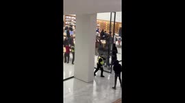 Hooded youths raid Apple store in London, England, UK