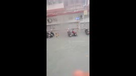 Heavy rain causes flood, submerging motorcycles in Malé, Maldives