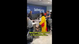 Funny performance! Because of the excess baggage, the girl puts on a lot of clothes!