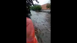 The guy fell into the water during the flood after a heavy downpour!