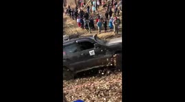 The man was almost crushed by an SUV at a car competition in Russia!