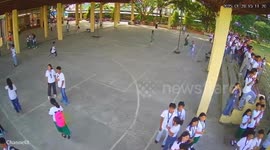 Children flee as tornado-like winds from helicopter rip through schoolyard