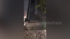 Fire rips through hotel in Bangkok sending guests fleeing into street
