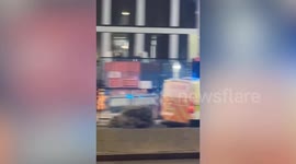 Moment daredevil base jumper parachutes off 500ft skyscraper