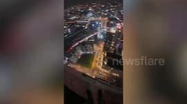 UK: Daredevil base jumper parachutes off 500ft skyscraper