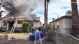 US: Firefighters Rescue Child From Burning Home in San Bernardino