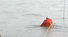 Indian PM Narendra Modi takes dip in holy river for Kumbh Mela