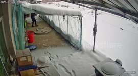 Snow-covered roof collapses as residents tried to clear yard