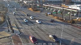 Truck shunts car can pushes it through intersection in terrifying hit-and-run