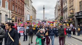 Anti-racism protesters marching through Whitehall, London, UK.
