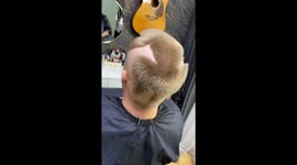 Exclusive: Barber's cat inspired hairdo goes viral with 3 million views on tiktok