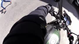 Scooter Mishap on Road Captured in Bangalore