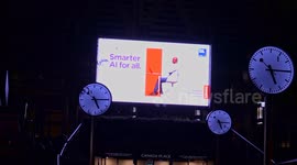 A View Of Canary Wharf Reuters Square Clocks and Display by Night