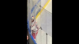 Hockey Player Stuck In Boards