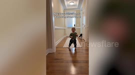 Twins take their first steps at exactly the same time