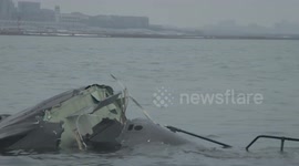 Search teams scour Black Hawk helicopter wreckage after Potomac River mid-air collision with plane