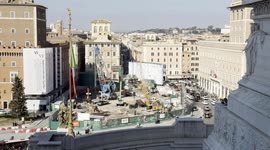Overview of Piazza Venezia and the construction site of the new Metro C station in Rome.