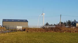 Wind turbine service,  a generic video of a service engineer using a cherry picker.