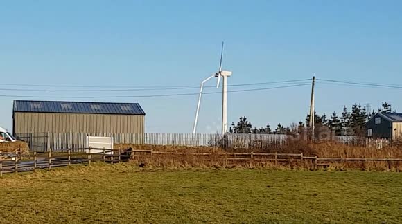 Wind turbine service,  a generic video of a service engineer using a cherry picker.