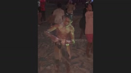 Teenager uses foam party as a chance to clean his clothes