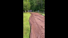 Caring aunt's birthday party slip-and-slide demonstration turns into a hilarious face-plant fail
