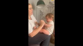 Adorable baby delights grandma with a cute scream while she's singing