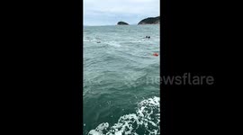 Heroic fishermen save 2 sinking crew members in dramatic rescue off China's south coast