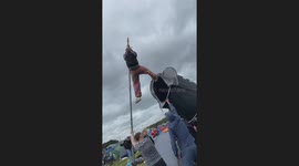 Camper balances tent on a 20-foot pole to create an epic camp flag