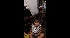baby laugh with her father