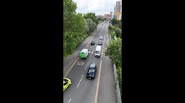 Aerial filming mishap: Boy crashes his drone into a tree while capturing road traffic