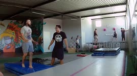 Front-flip goes awry as acrobat's overrotation leads to embarrassing tumble