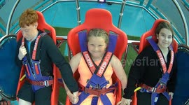 Fear turns into smiles: Little girl enjoys slingshot ride after overcoming fear