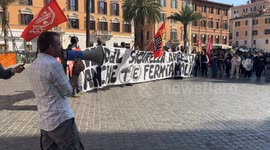 A protester speaks into a megaphone while other protesters display a banner with the slogan ‘the security bill arrests you too, let’s stop them!’ During the demonstration against the security decree, the law decree 1660 on public safety, organized by the