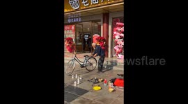 China: An Elderly Man Performing Acrobatics