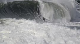 Surfers brave big waves of Portugal's Nazare in Portugal, 6 February, 2025.
