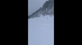 Skier Tumbles Down a Minor Drop