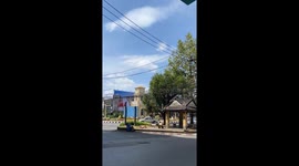 Backpackers seen sunbathing topless on pavement in Phuket