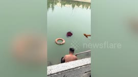 Brave man who could only doggy paddle saves drowning woman from freezing river