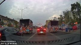 Chinese opera performers fall from moving truck