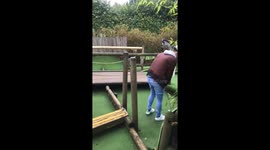 Headshot! Man's shot rebounds and smacks him on the head during crazy golf