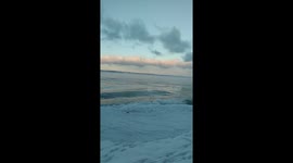This is very sweet sunset on Lake Baikal. With the slow waves and some pink clouds