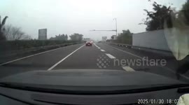 Motorist crashes while avoiding biker speeding wrong way down road