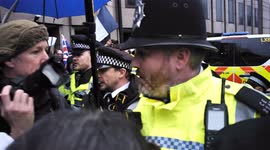 Scuffles broke out with the police as they tried to maintain control during the Chinese protest in London.