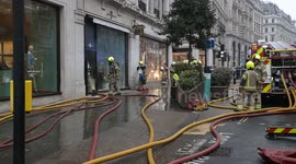 Firefighters are called to extinguish a fire at the shop “7 For All Mankind”, London, UK