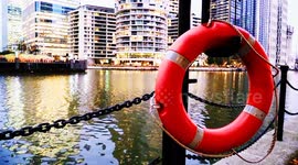Lifebuoy on The Promenade Railing at South Quay, Canary Wharf, London, England